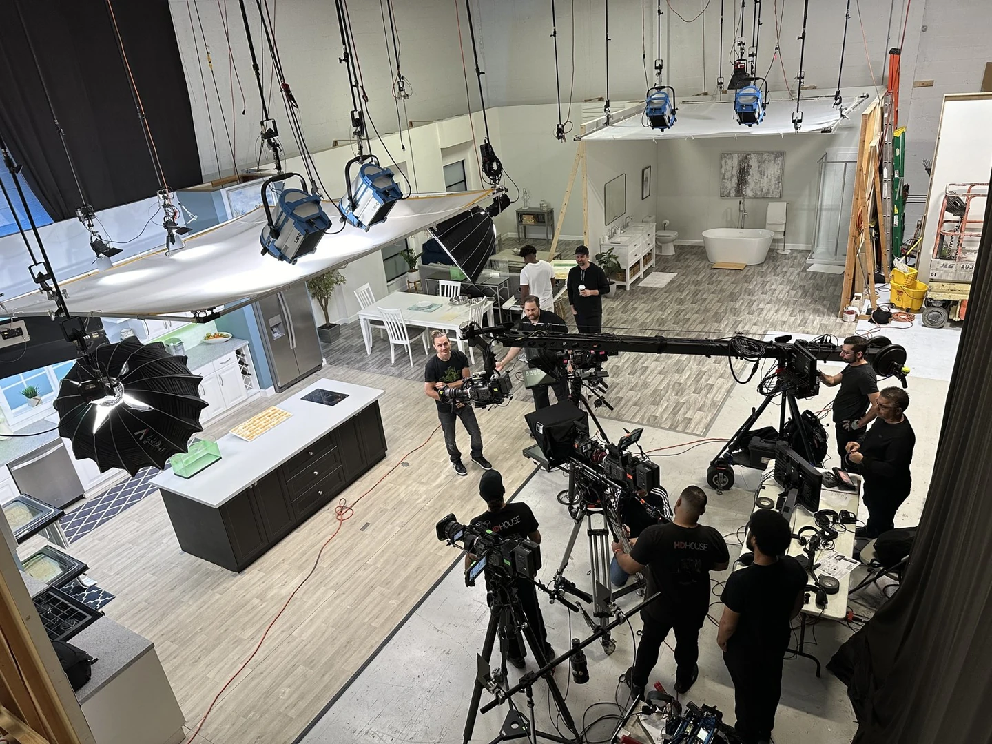Camera crews, a camera crane and lighting on a product demonstration set from the Telebrands creative archive